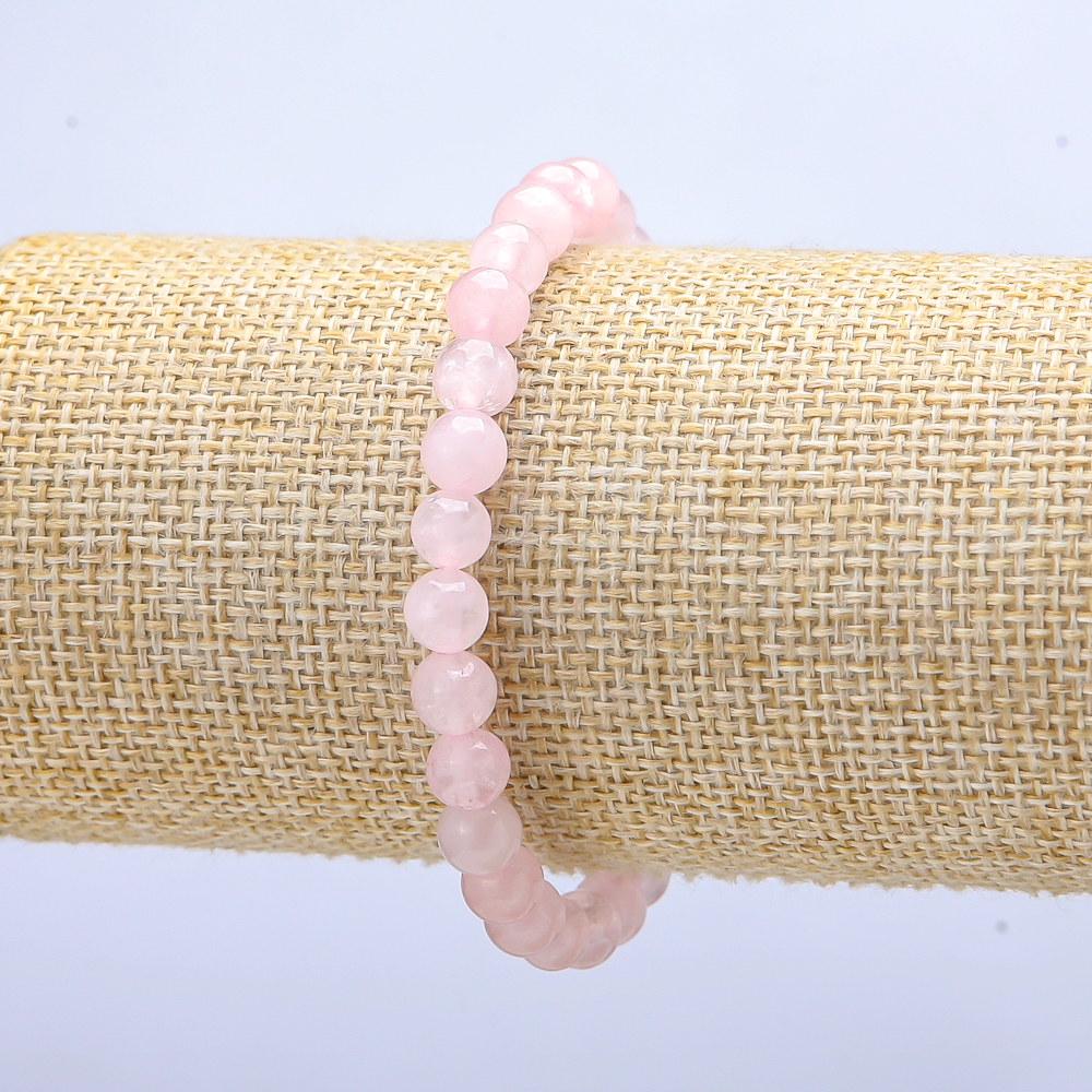 Elastic bracelet with Pink Quartz smooth beads, diameter 6 mm ±, length 18 cm ±