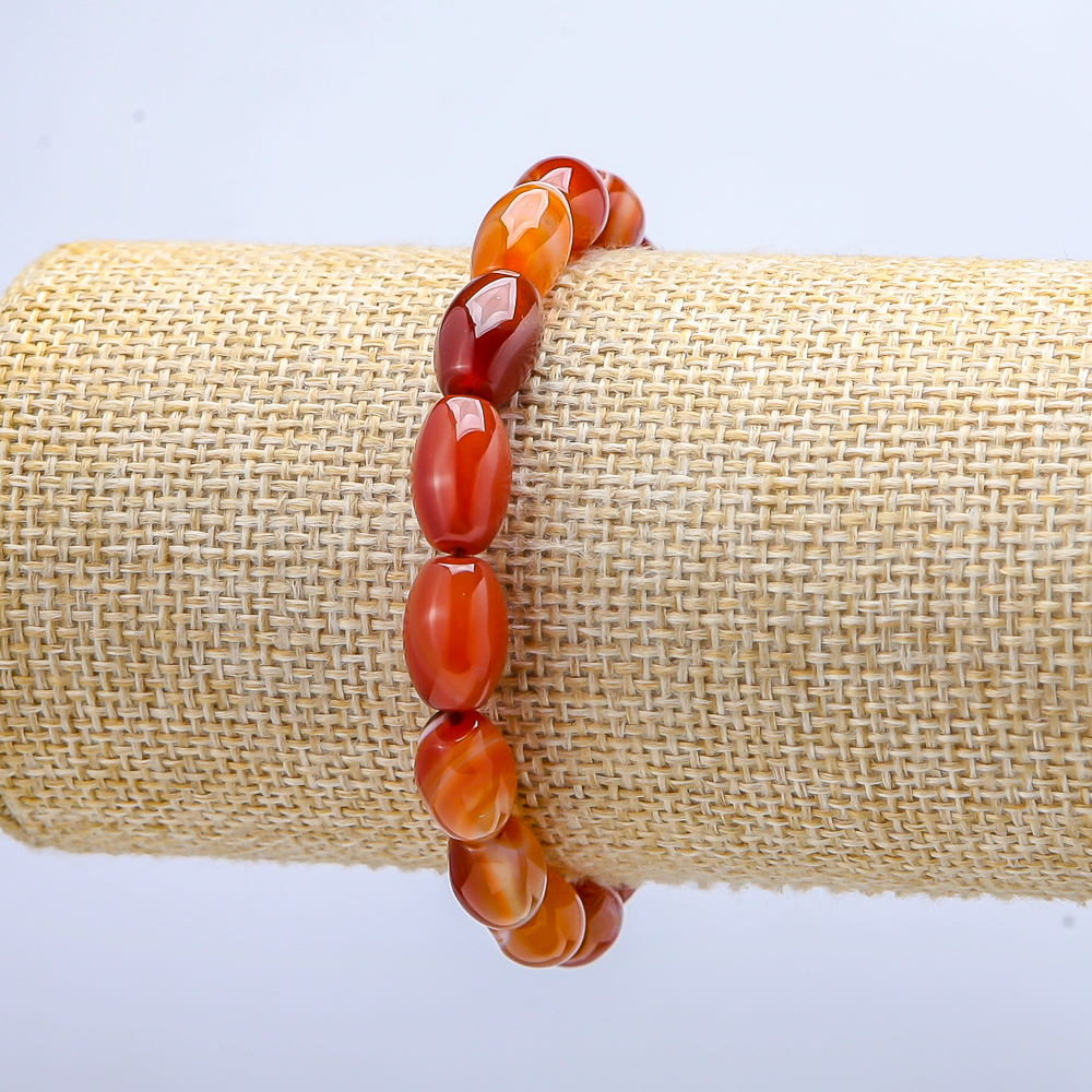 Elastic carnelian bracelet with barrel beads, 8x12 mm diameter, length 18 cm+