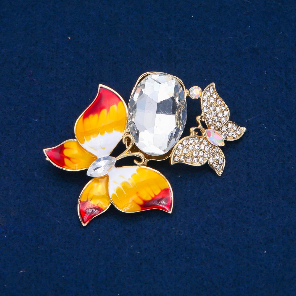 Brooch 'Butterflies' in golden metal, white crystals, enamel and white crystal, 47×63 mm +