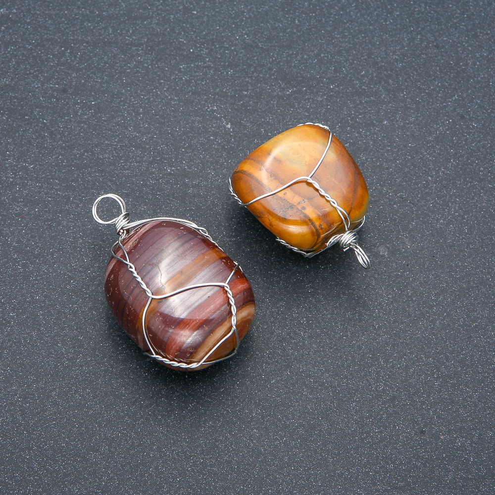 Pendant in a silver-woven setting with Tiger's Eye natural stone, diameter 35×20 mm+