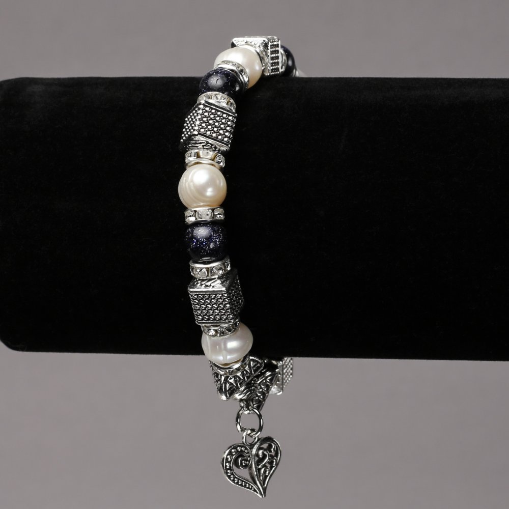 Elastic bracelet with freshwater pearls and aventurine 'Blue Sand' with silvery inserts, rhinestones and pendants, diameter 8 mm, length