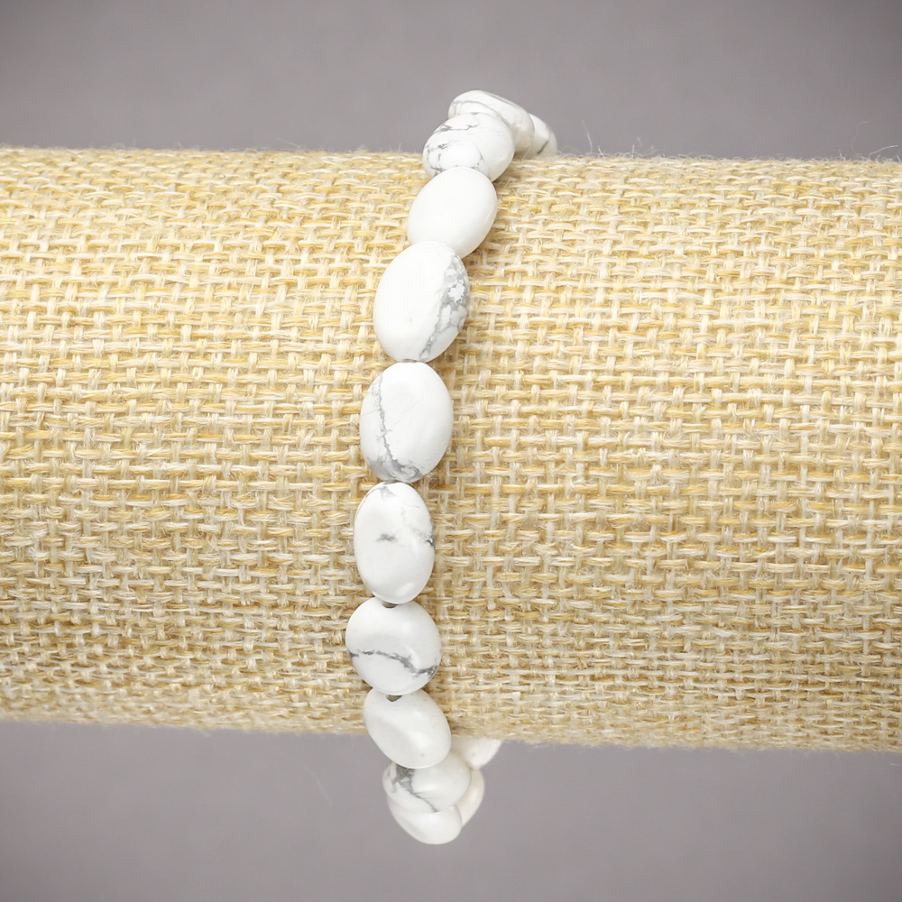 Elastic bracelet with natural howlite beads, smooth oval, 10×8 mm, length 18 cm +/-