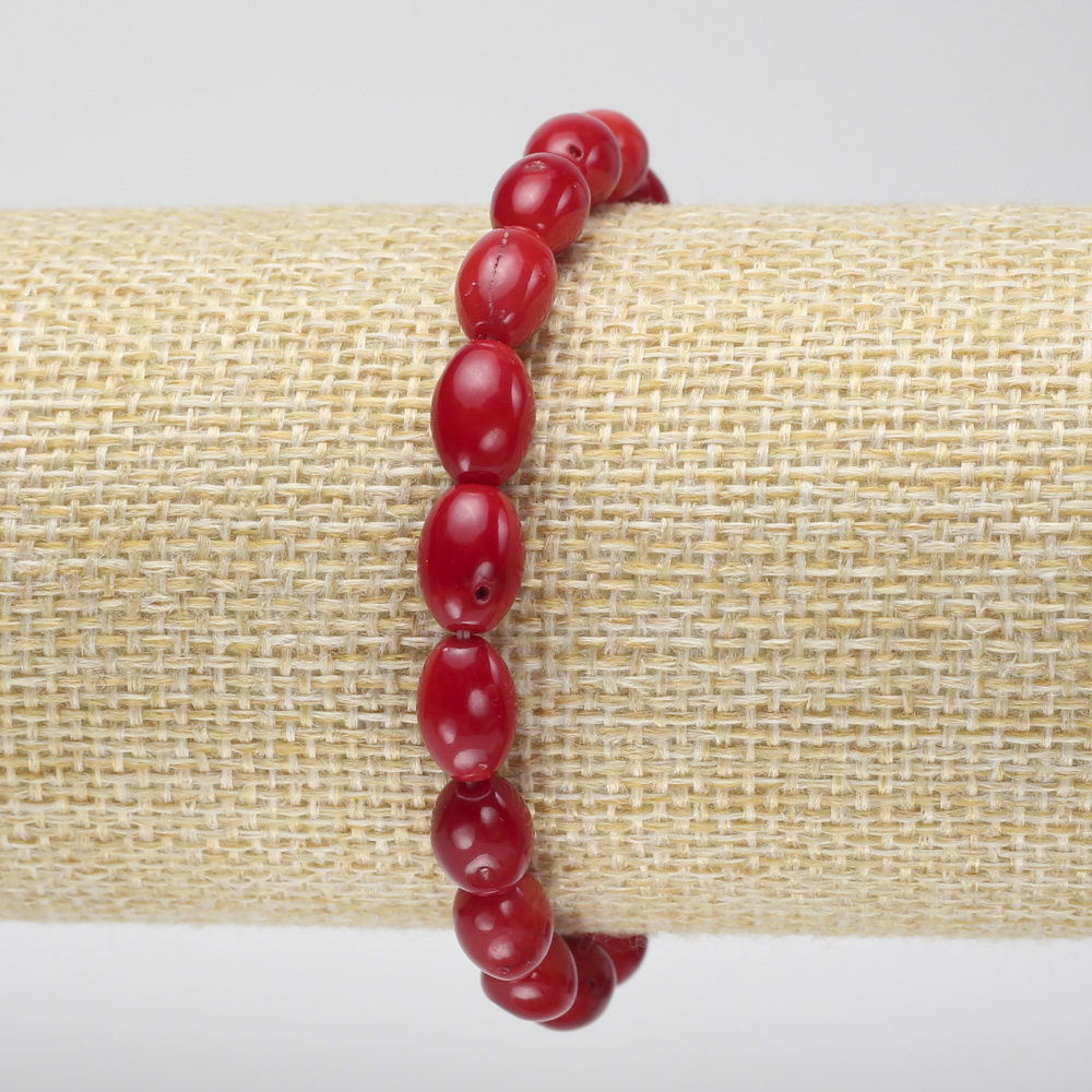 Bracelet made of natural coral, oval beads, diameter 11×6 mm, length 18 cm ± (stretch)