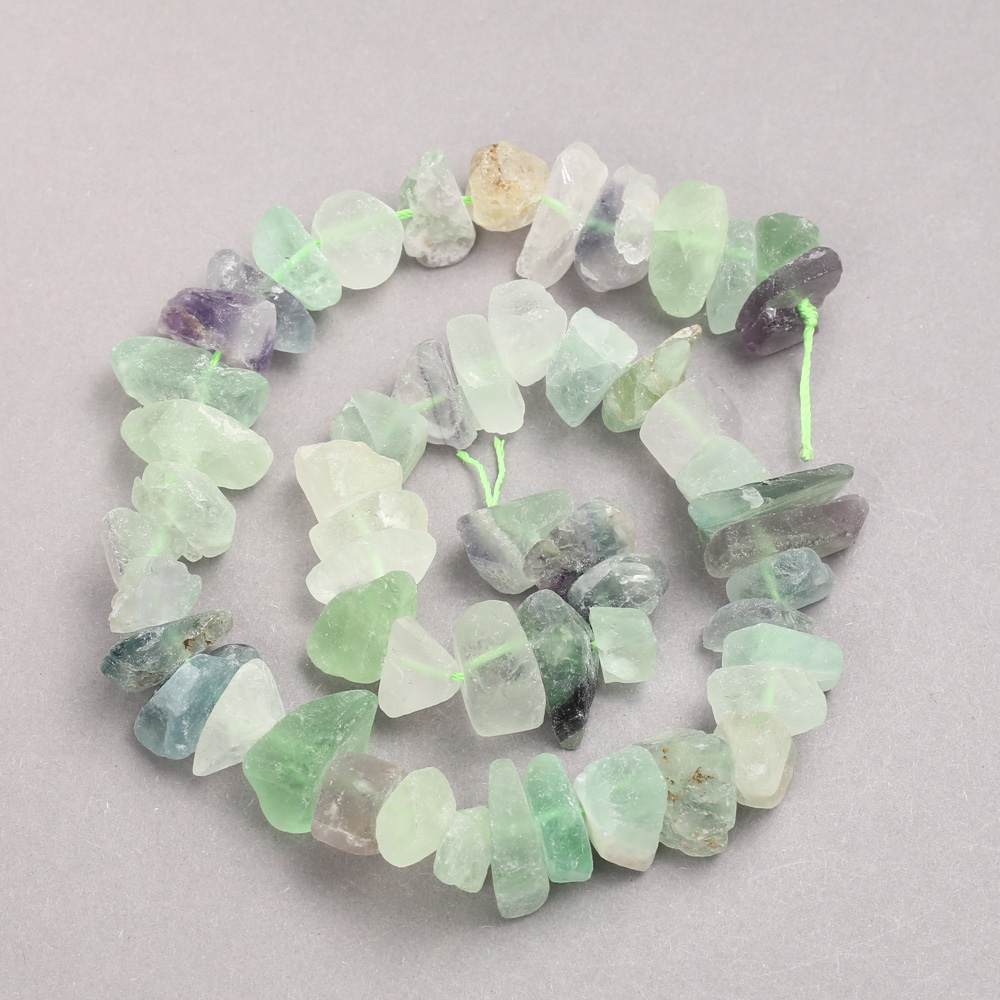 Unpolished fluorite beads on a thread, 10x15 mm diameter, length 42 cm +-