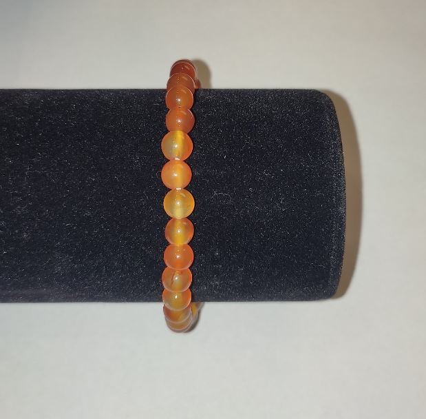 Carnelian bracelet — smooth beads, 6 mm diameter ± (stretch)