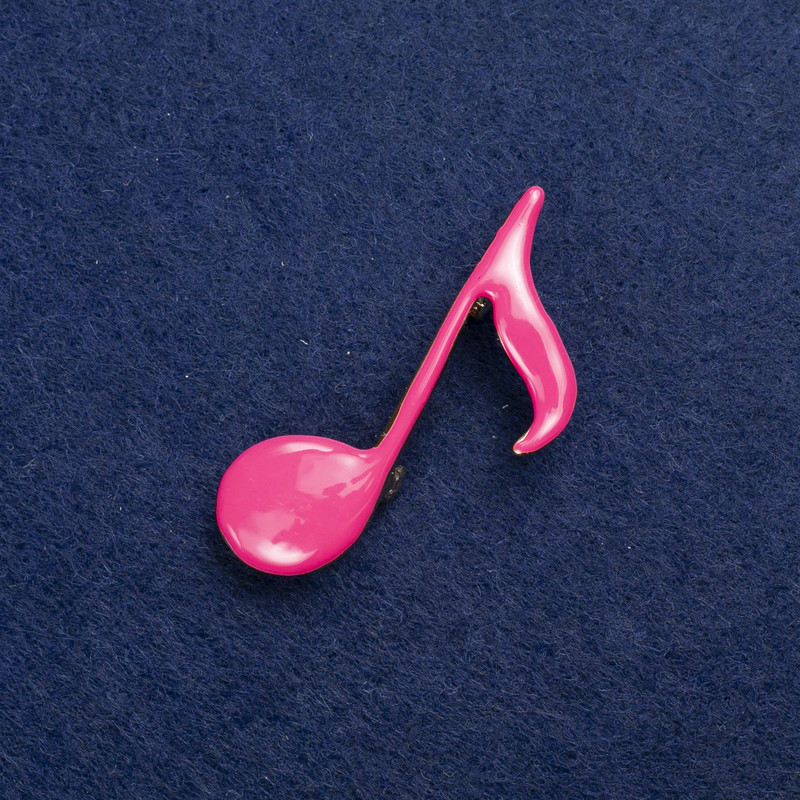 Brooch 'Note' in gold-toned metal and enamel 25×45 mm +