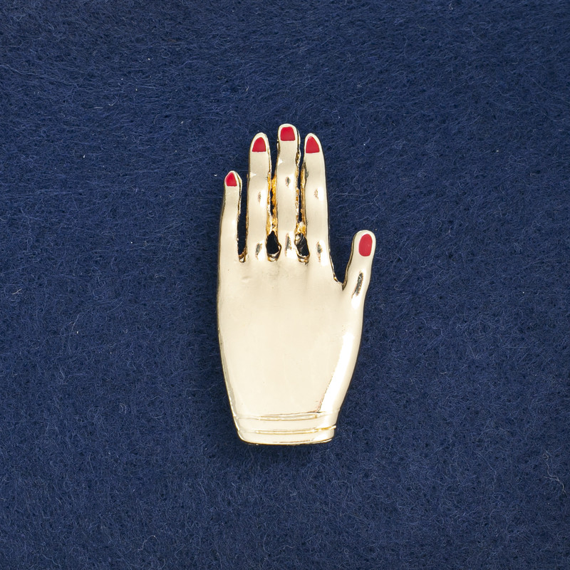 Clearance brooch 'Hand' in golden metal and enamel 44×21 mm +