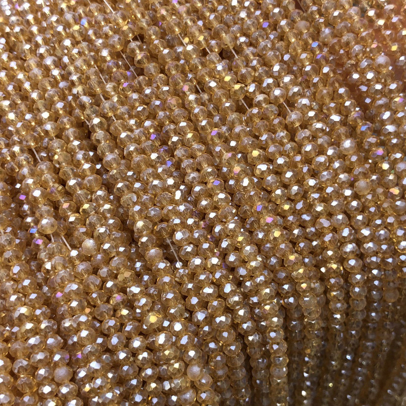 Czech Crystal Beads on Fishing Line Orange-Peach Transparent with Petrol Glow, Faceted Rondelle, Diameter 3x2.5 mm + -, Length 36 cm +