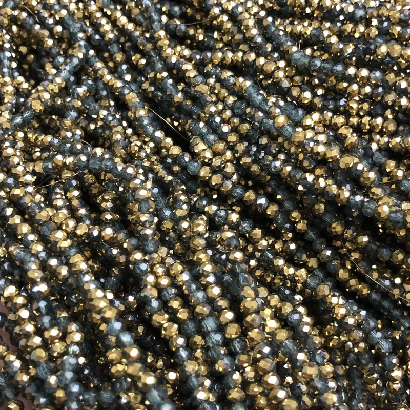 Beads Czech Crystal on fishing line assorted gray and transparent with golden coating, faceted rondelle, diameter 3×2.5 mm, length 36 cm