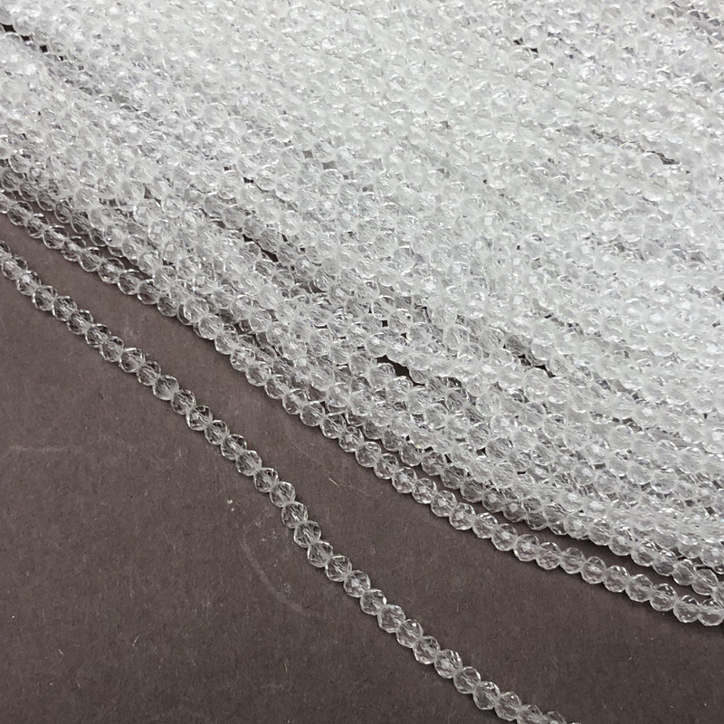 Beads of Czech crystal on thread, white transparent faceted rondelle, diameter 3.5×3 mm, length 36-38 cm