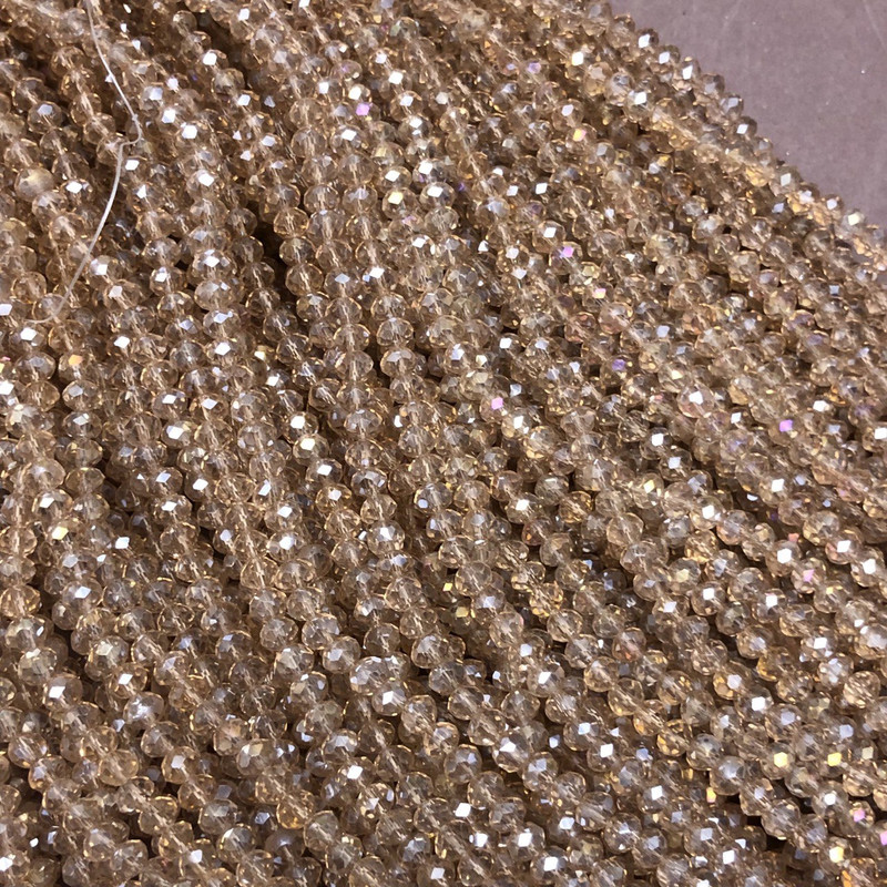 Beads Czech Crystal on Beading Thread Champagne Transparent with Petrol Iridescence, Faceted Rondelle, Diameter 3.5×3 mm, Length 36-38 cm