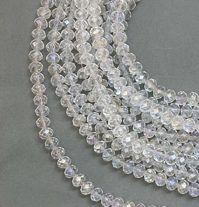 Beads Czech Crystal on a beading thread White transparent with gasoline sheen, faceted rondelle, diameter 8x6 mm + -, length 40-42 cm +