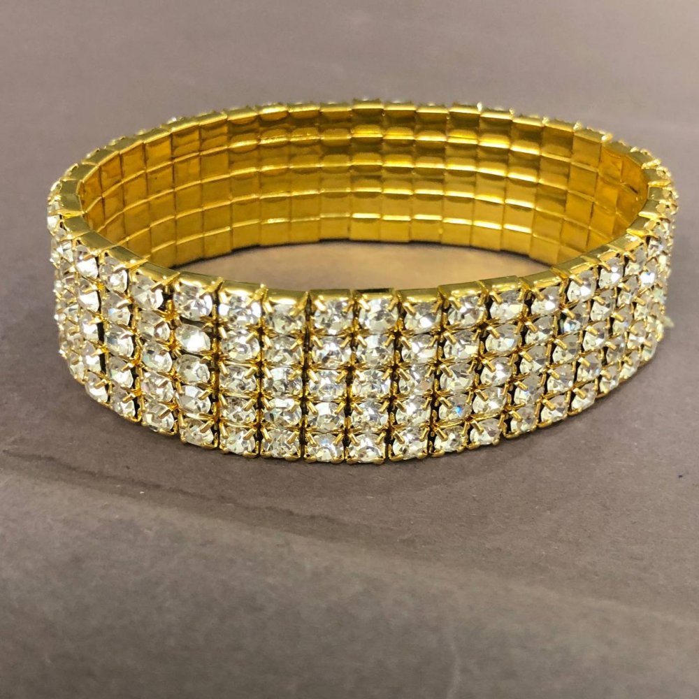 Five-row stretch bracelet with white crystals, gold-tone metal, 16-17 cm circumference