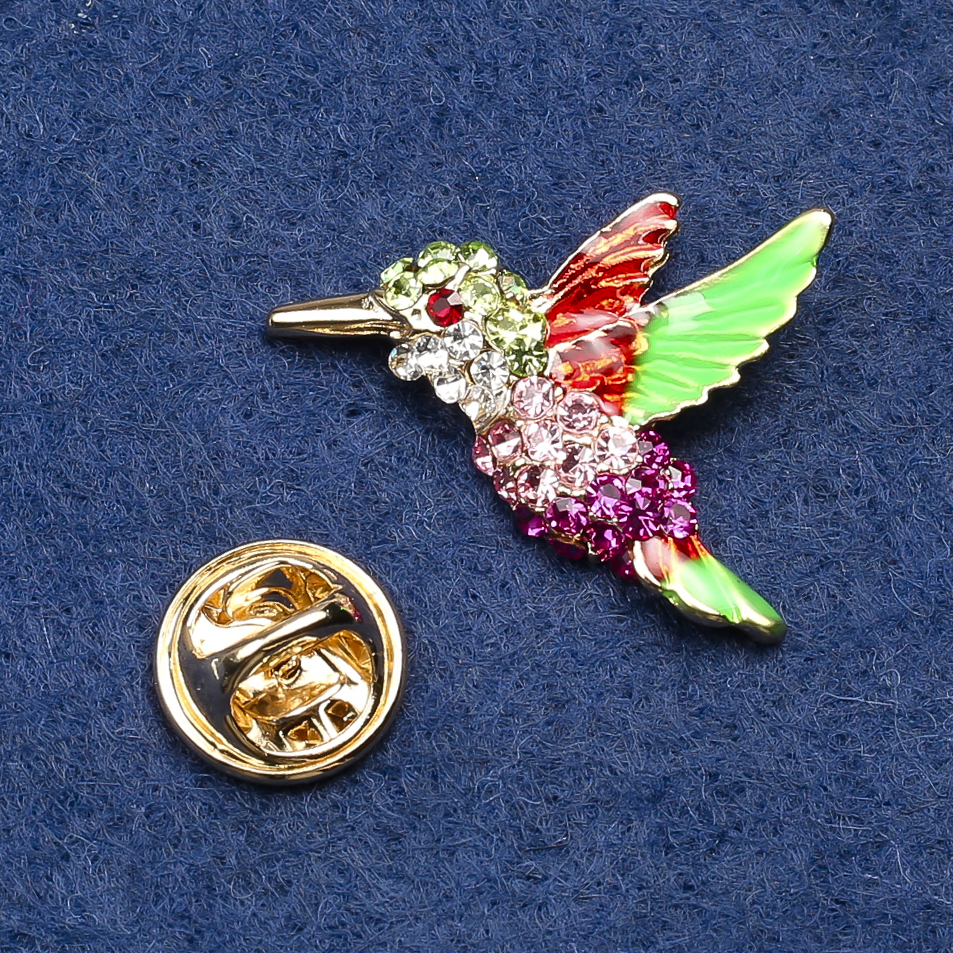 Brooch Hummingbird with golden metal, enamel and rhinestones, 26x20mm +