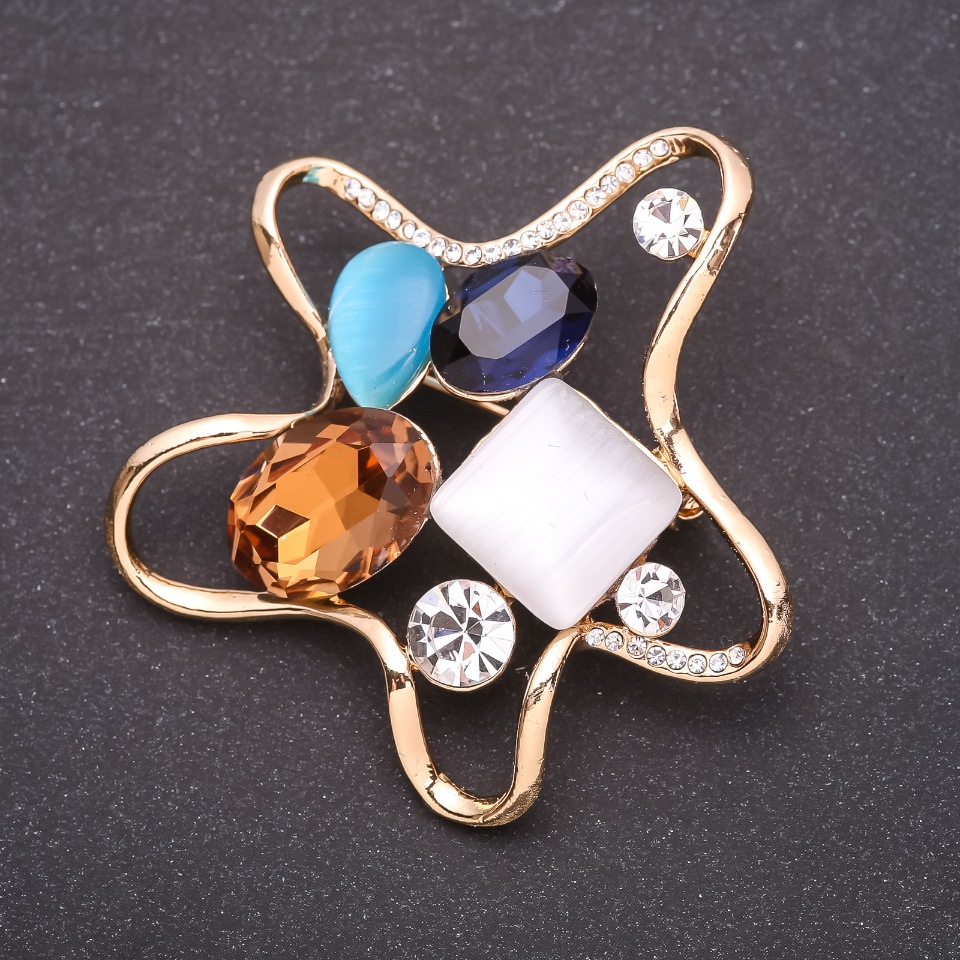 Brooch 'Sea Star' with multicolored crystals, 55x55 mm, yellow metal