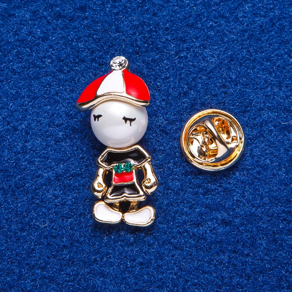 Gold-tone screw-back brooch 'Boy' 2.8 × 1.3 cm