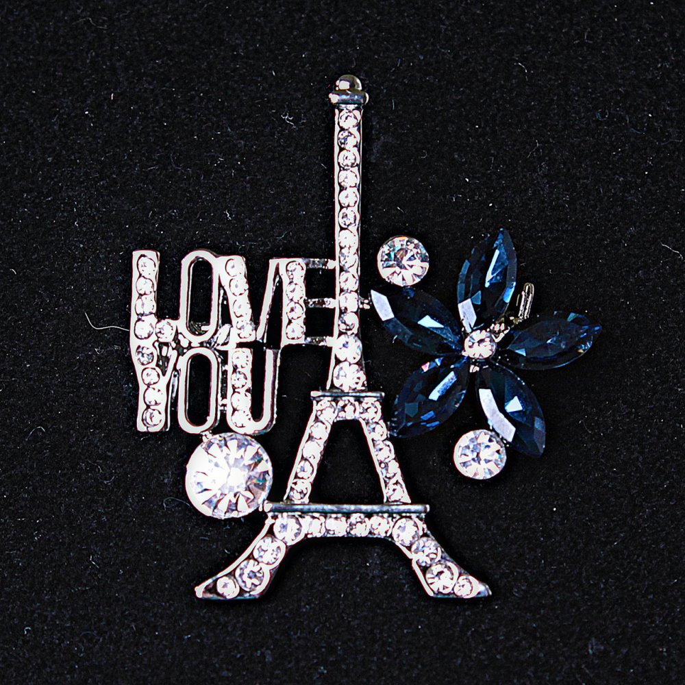 Brooch Paris with silver-toned metal, rhinestones and blue crystals, 40x35mm +