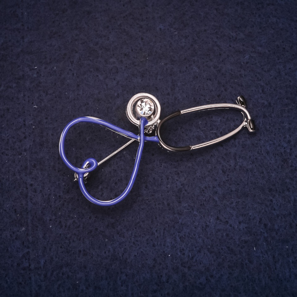 Brooch 'Stethoscope' 25x53 mm enamel with crystals blue and white silver-tone metal