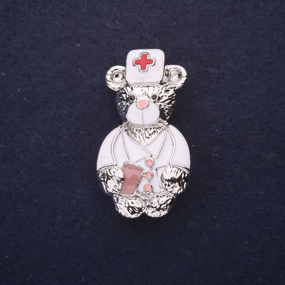 Brooch Doctor Bear enamel white and red 40×22 mm silver-tone metal