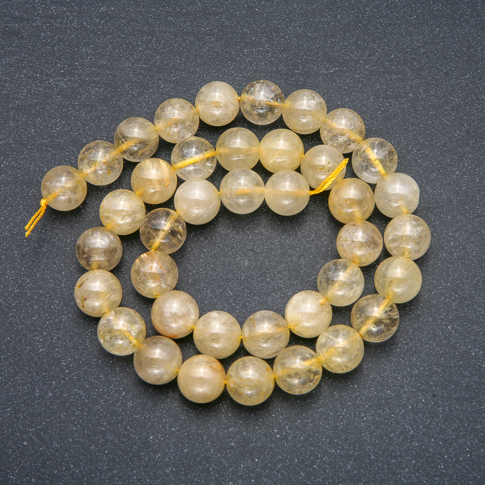 Beads on a cord natural stone rutilated quartz, hair-like smooth beads, diameter 10mm, length 39cm
