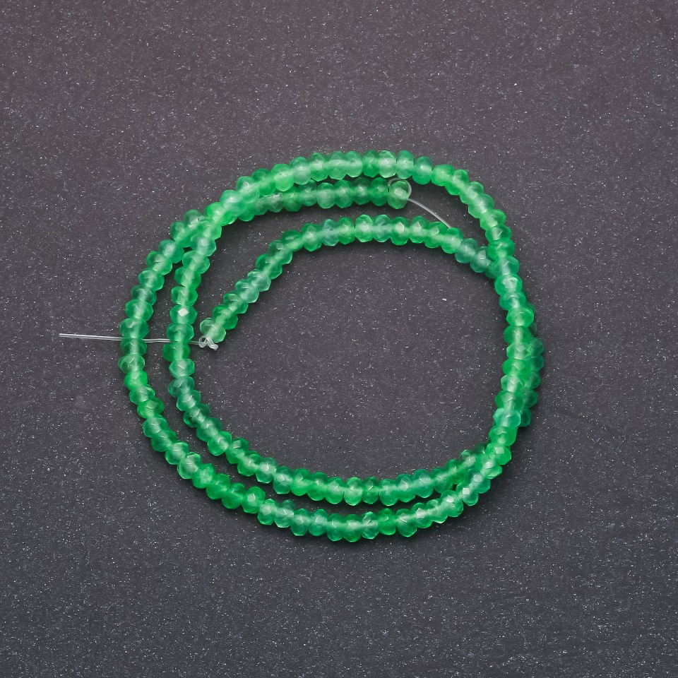 Tinted synthetic peridot beads, faceted rondelle, 4x2 mm, 38 cm strand