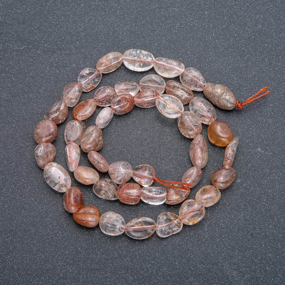 Beads on a thread of natural stone Rutile Quartz briolette, 7x10 mm diameter, 40 cm length +