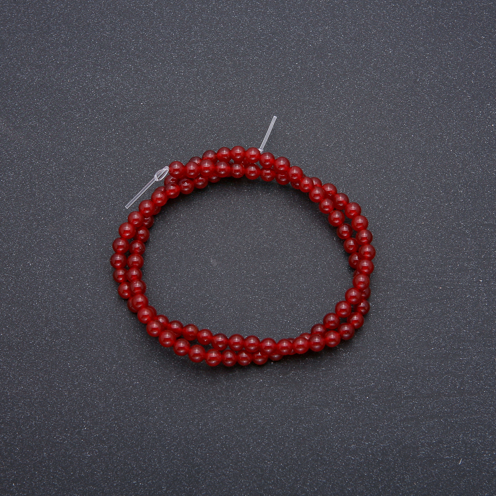 Carnelian smooth round bead on cord, 4 mm diameter, 39 cm length