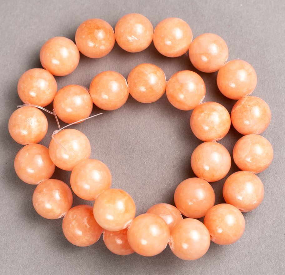 Beads 'Celestite' on fishing line (synthetic acrylic), smooth spheres, 14 mm diameter, about 39 cm long