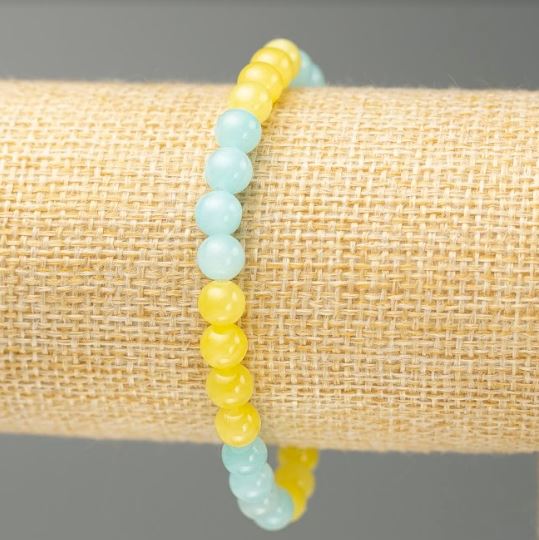 Elastic bracelet with acrylic beads imitating Aquamarine and Citrine, 6.5 mm diameter, 18 cm length