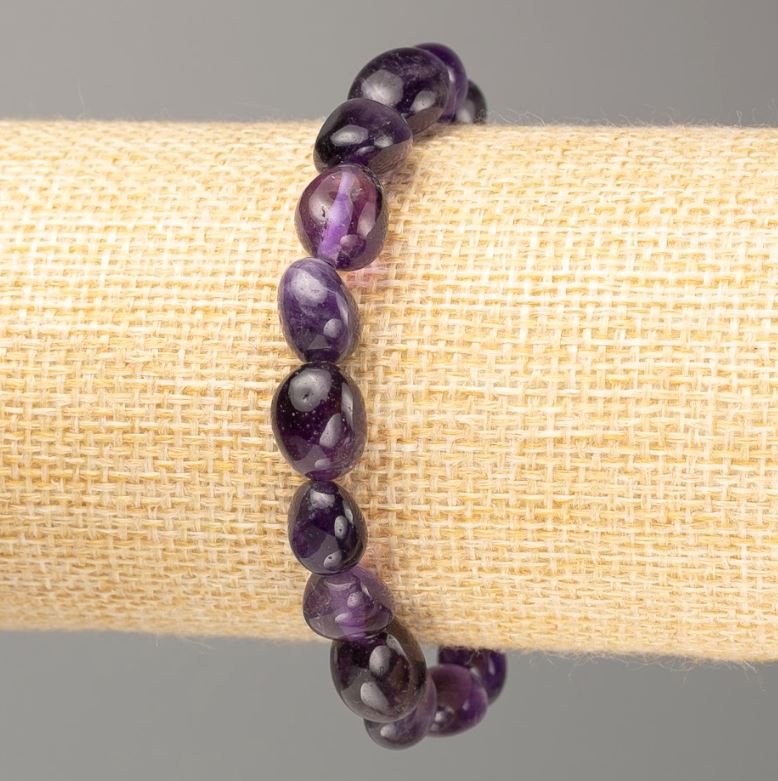 Elastic bracelet with natural amethyst, faceted, circumference 18 cm, diameter 11x8 mm +