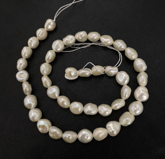 Freshwater Pearl Strand, diameter 9×8 mm, length 40 cm ± with gasoline iridescence