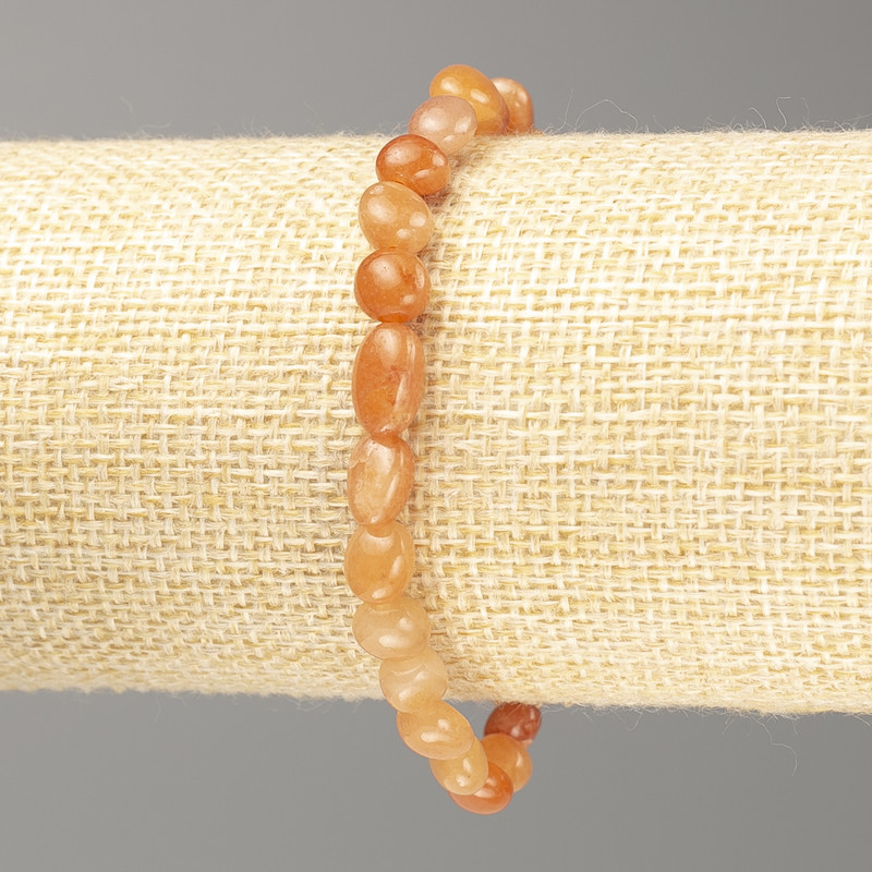 Carnelian natural stone bracelet, faceted, on elastic cord, diameter 10×6 mm, length 18 cm