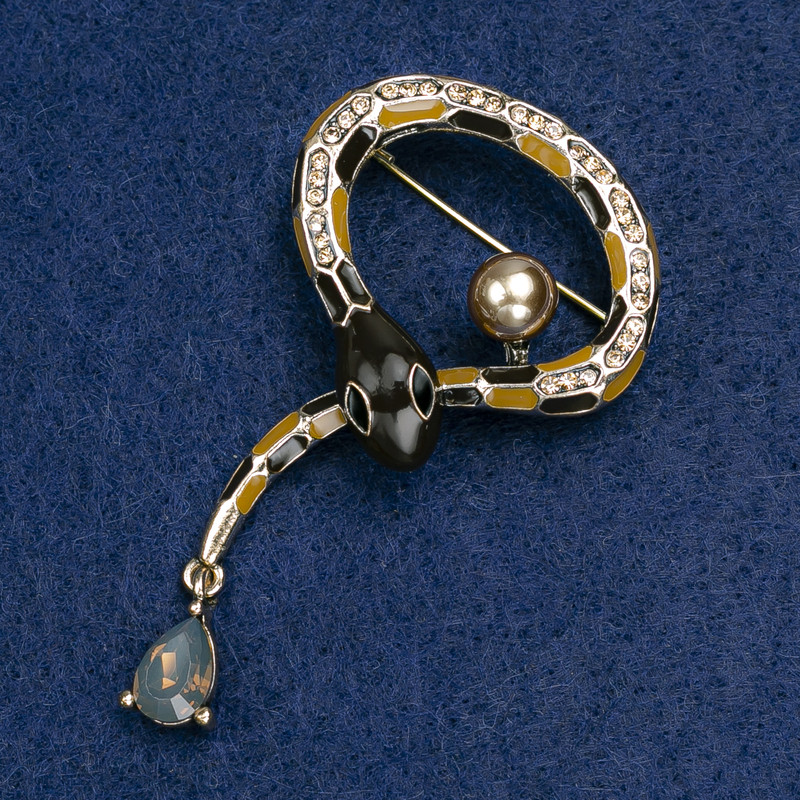 Snake Brooch with black and brown enamel, crystal, bead, and golden rhinestones, gold-tone metal 35×64 mm