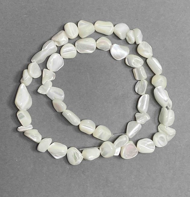 Mother-of-pearl faceted beads, 8x6 mm, 41 cm long on beading wire