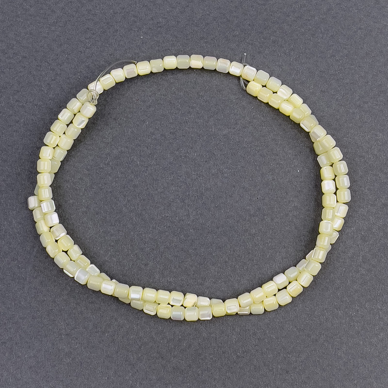 Tinted yellow mother-of-pearl cylindrical beads, diameter 3.5×3.5 mm, length 40 cm on a thread