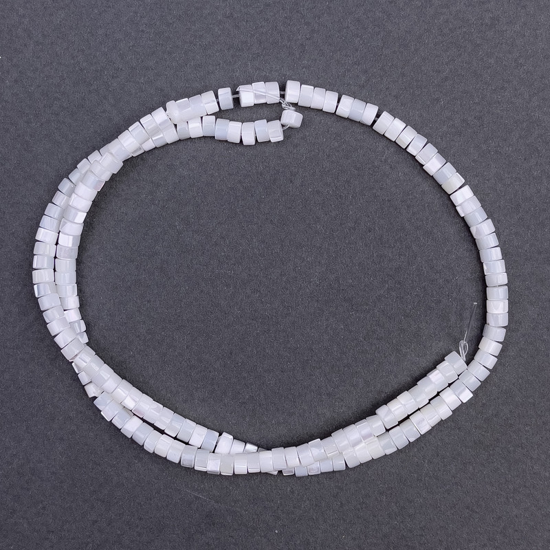 Tinted white mother-of-pearl beads, disc-shaped, 4x2 mm diameter, 40 cm length on thread