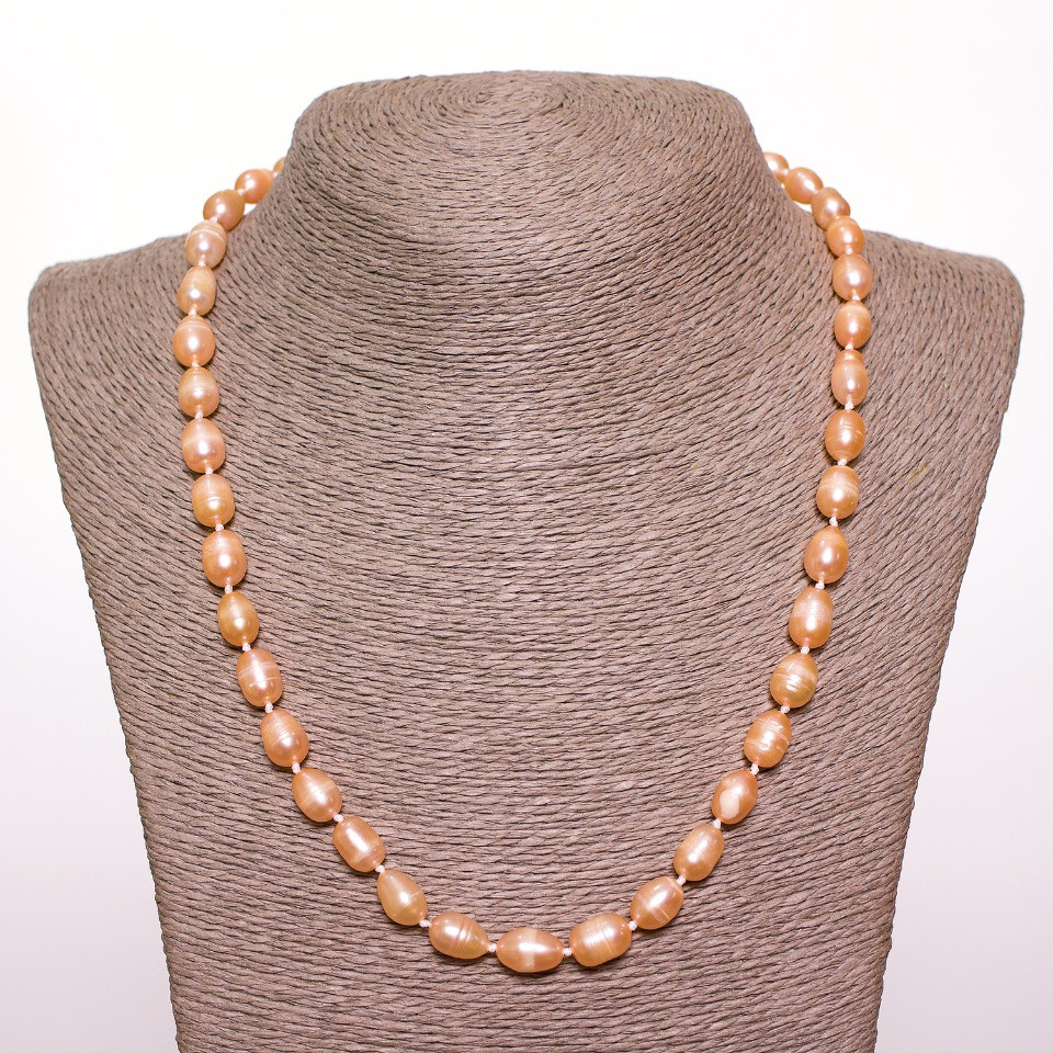 Peach-colored oval freshwater pearl necklace, 8×10 mm diameter, 50 cm long