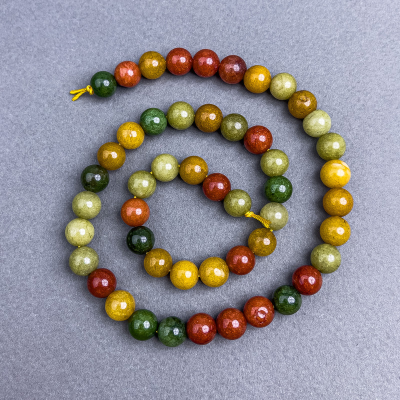 Assorted natural stone beads, smooth round beads, 8 mm diameter, on a thread, length 39 cm