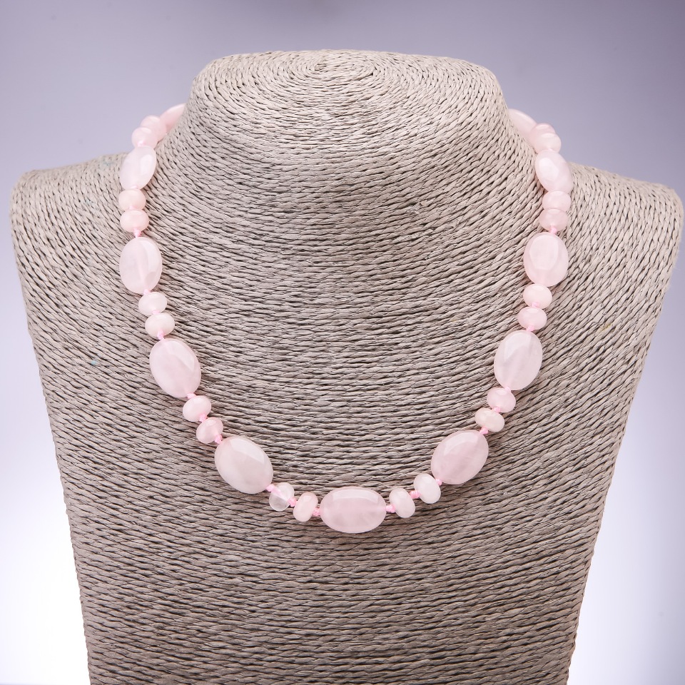 Necklace of natural pink quartz, flat oval beads, 13x18 mm; rondelle beads 9x6 mm; length 45 cm