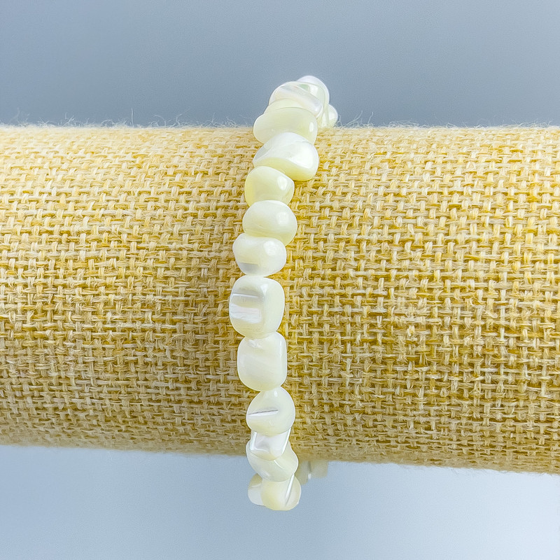 Faceted white mother-of-pearl bracelet, diameter 8×6 mm, length 18 cm (stretch)