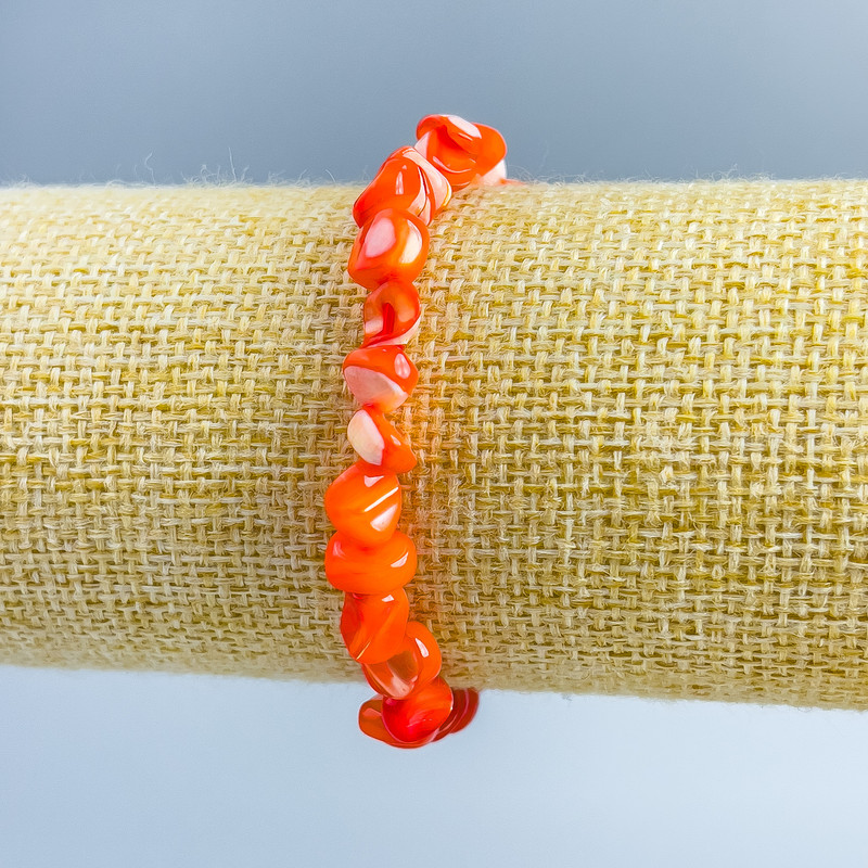 Orange mother-of-pearl bracelet with faceted beads, diameter 8x6 mm, length 18 cm (stretch)