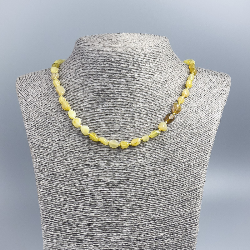 Citrine stone necklace, opaque, faceted, diameter 7x10 mm ±, length 50 cm ±