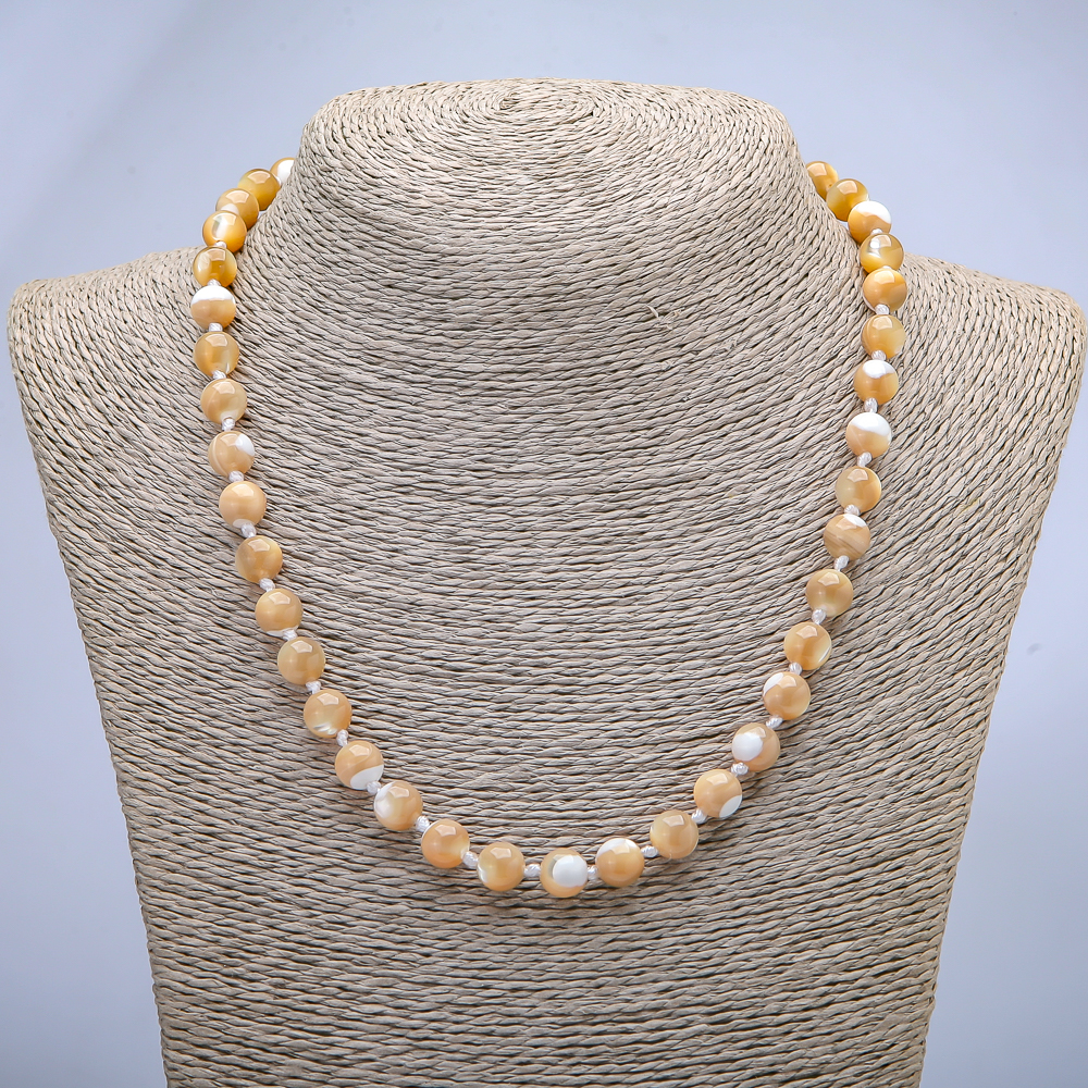 Necklace made from natural beige mother-of-pearl — smooth bead, about 8 mm in diameter, length 45 cm