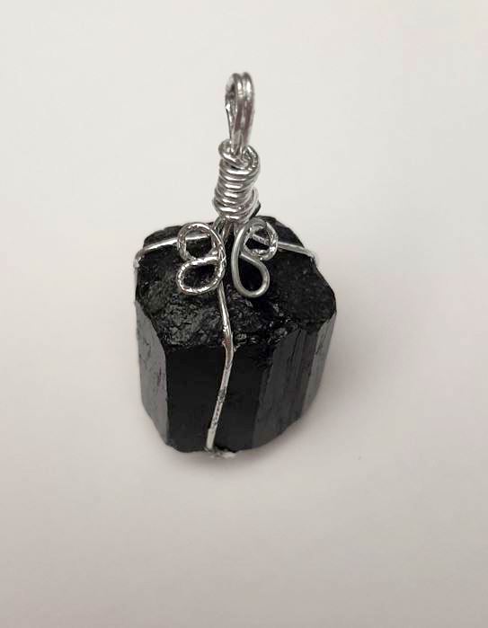 Pendant with natural Tourmaline Schorl, 27x16 mm +/- silver-tone setting, shape may vary