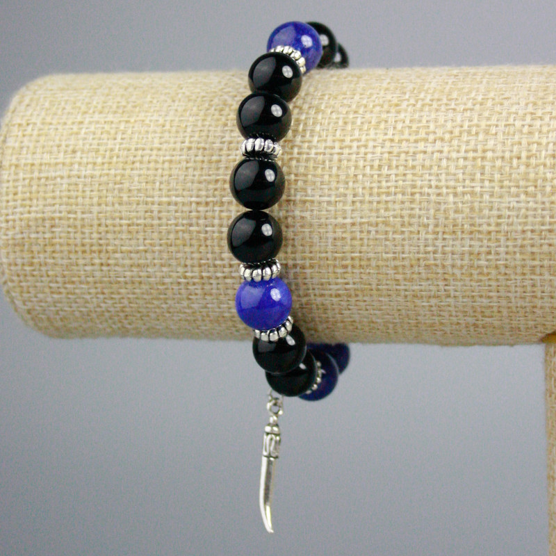 Black Agate and Lapis Lazuli Bracelet (artificial acrylic) smooth beads, 10 mm diameter ±, with silver-tone wolf inserts, length 18 cm ± (stretch)