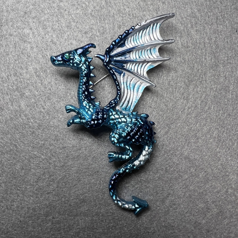 Dragon Brooch with blue enamel on silver metal, 42x66 mm