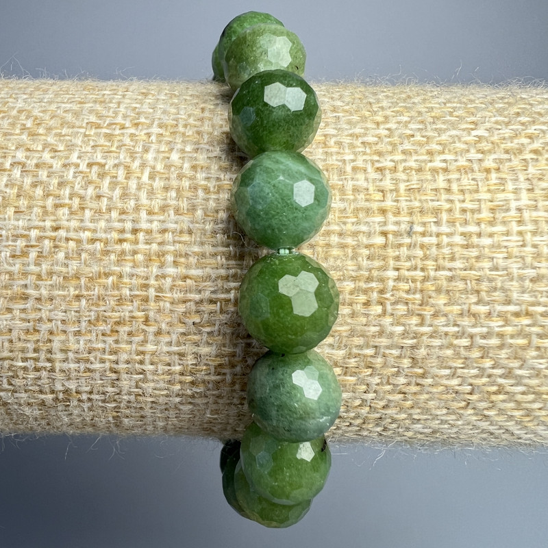 Bracelet of Canadian jadeite, natural stone, faceted bead, 10 mm diameter, 18 cm length (stretch)