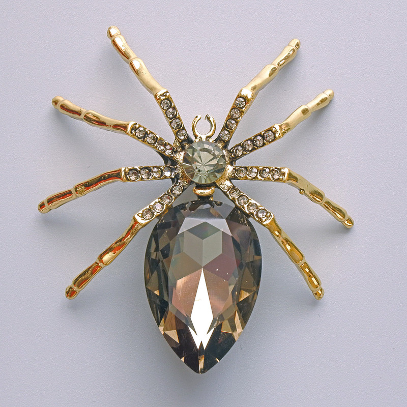 Brooch-pendant Spider with gray crystals, gray rhinestones, golden metal 56x64 mm